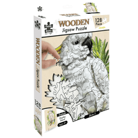 Wooden jigsaw puzzle box with cockatoo image and hand holding a puzzle piece