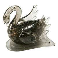 3D crystal swan puzzle sculpture on clear base, dark metallic finish