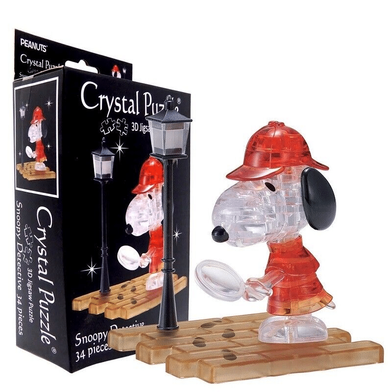 3D crystal puzzle figure: red detective hat, clear body, black ears, on wooden base
