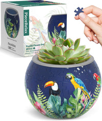 3D puzzle flowerpot with green succulent and colorful birds on blue body, gray rim