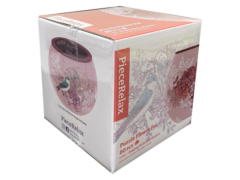 Puzzle flowerpot box with pink bird and floral artwork, branded packaging text