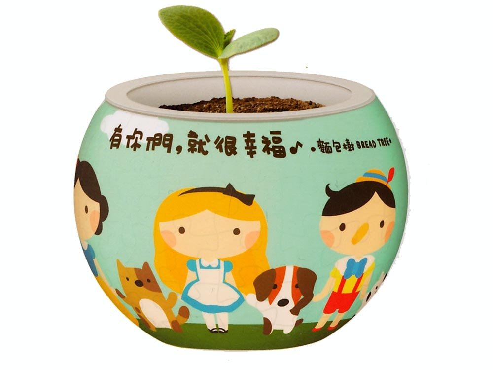 Round flowerpot with green sprout and cartoon friends and animals on aqua sides