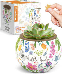 Floral ceramic-style puzzle plant pot with succulent plant