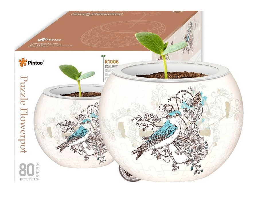 Decorative puzzle flowerpot with white ceramic look, blue birds and floral line art