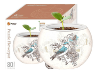 Decorative puzzle flowerpot with white ceramic look, blue birds and floral line art