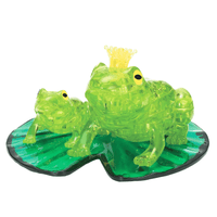 Green 3D frog crystal puzzle with crown and black eyes on teal base