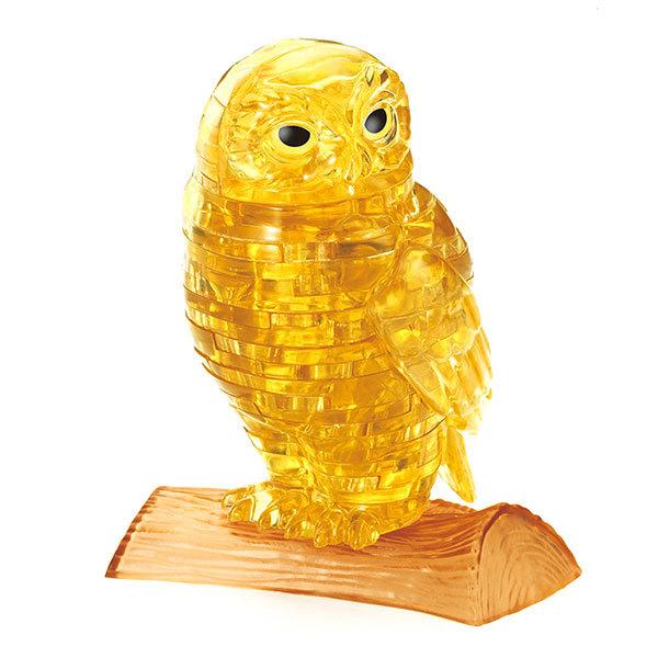 Gold owl crystal 3D puzzle with clear pieces on wooden base