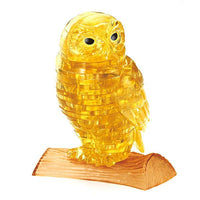 Gold owl crystal 3D puzzle with clear pieces on wooden base
