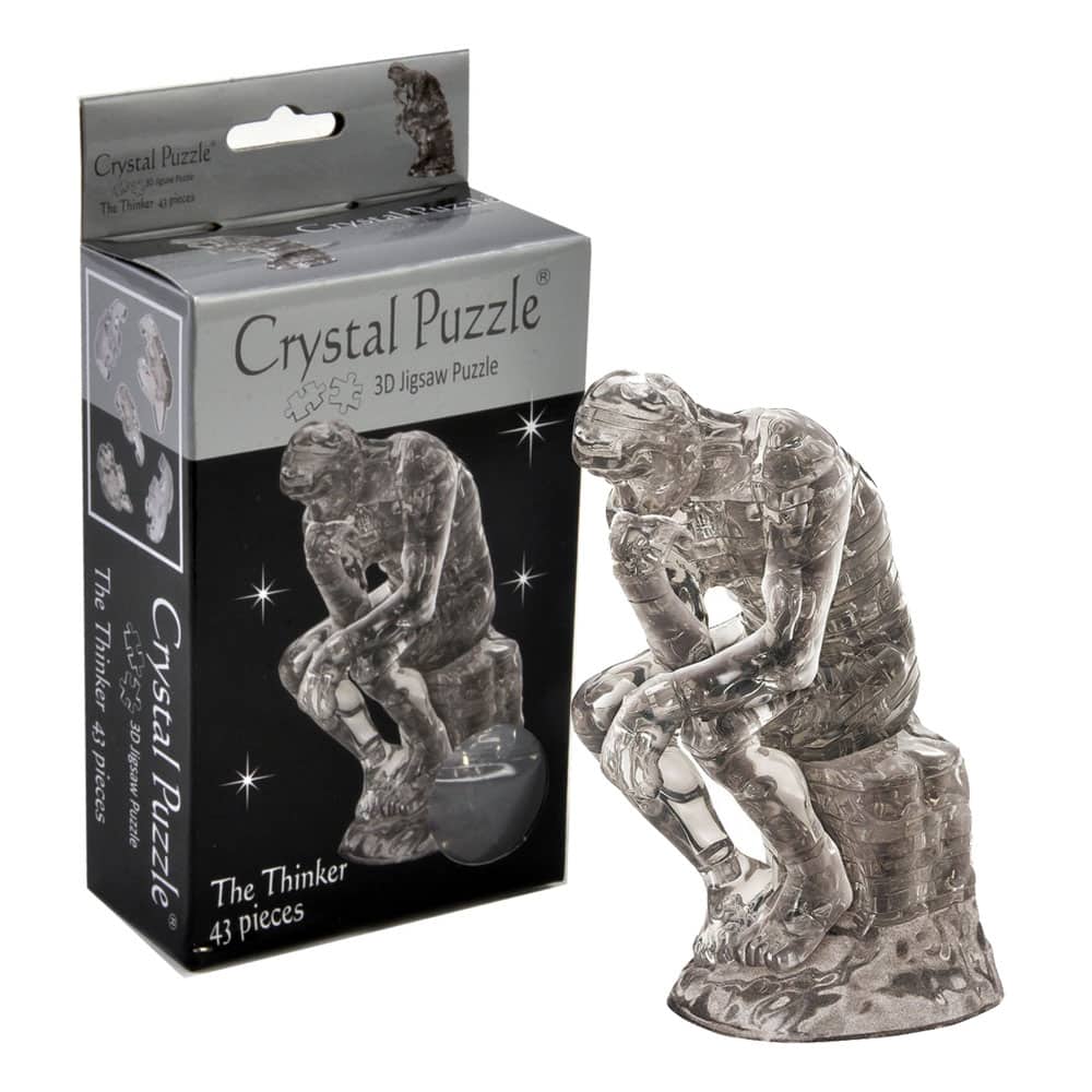 Crystal puzzle figure shaped like a thinker, clear gray translucent 3D design