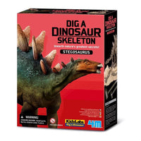 Dinosaur dig kit box with Stegosaurus skeleton artwork and warning label