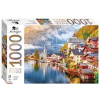 Mindbogglers 1000-piece jigsaw puzzle box, village scene artwork