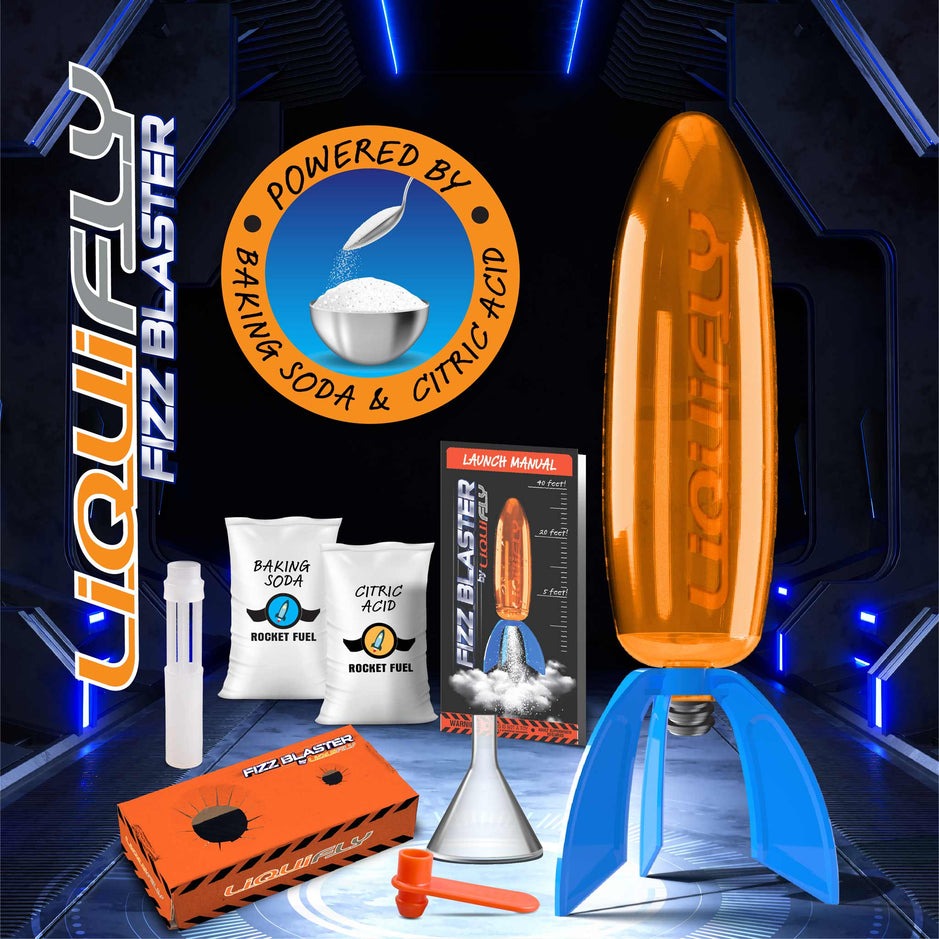 Liquifly Fizz Blaster kit with rocket fuel, baking soda, and citric acid on a dark background.