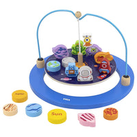 Blue space-themed balancing game with hoop and planet toy pieces