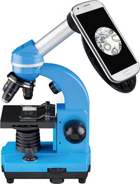Blue student microscope with smartphone adapter showing magnified specimen on screen