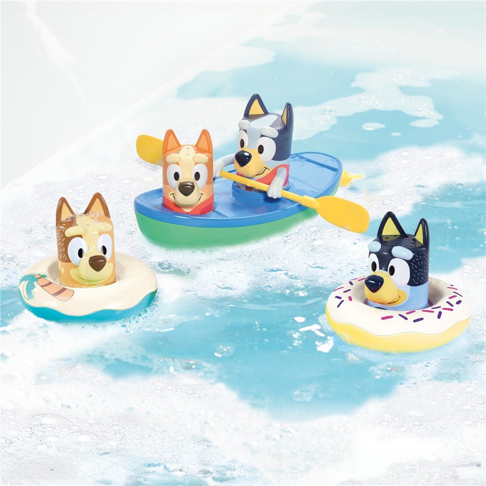 Kids bath toy set with three character boats in white, blue, and yellow.