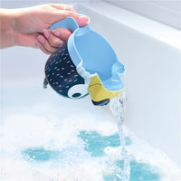 Bluey penguin bath pourer cup with spout pouring water