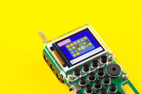 CircuitMess Chatter circuit board with LCD screen and button array