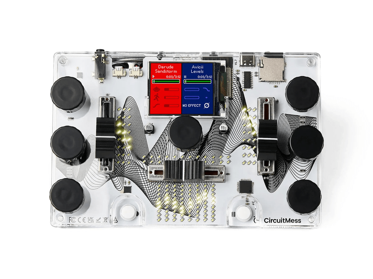 Transparent DJ mixtable electronics board with LCD screen and black control knobs/switches