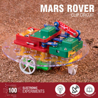 Programmable electronic Mars rover kit with green control box, red chassis, and clear wheels