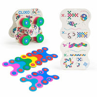 Colorful magnetic building set pieces with packaging cards showing building connectors