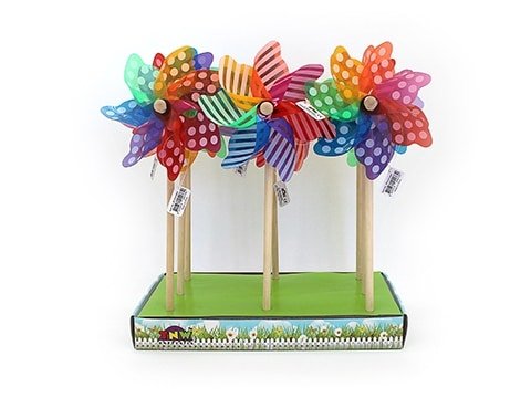 Colorful pinwheel windmills on wooden sticks, rainbow swirl blades