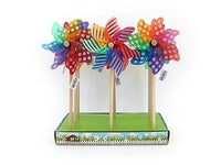 Colorful pinwheel windmills on wooden sticks, rainbow swirl blades