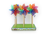 Colorful rainbow windmill pinwheels on wooden sticks set