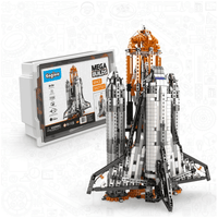 Space shuttle build model with product box in orange and gray