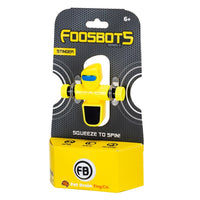 Yellow FoosBot Stinger toy robot on retail package, black spinning knobs