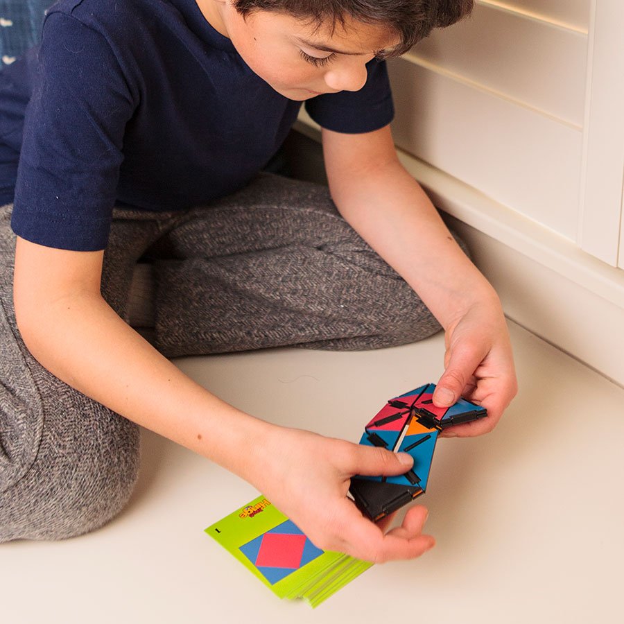 Hinge puzzle toy with blue and pink pieces and colorful card inserts