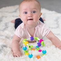 Colorful flexible sensory fidget cube toy with interlocking beads and rods