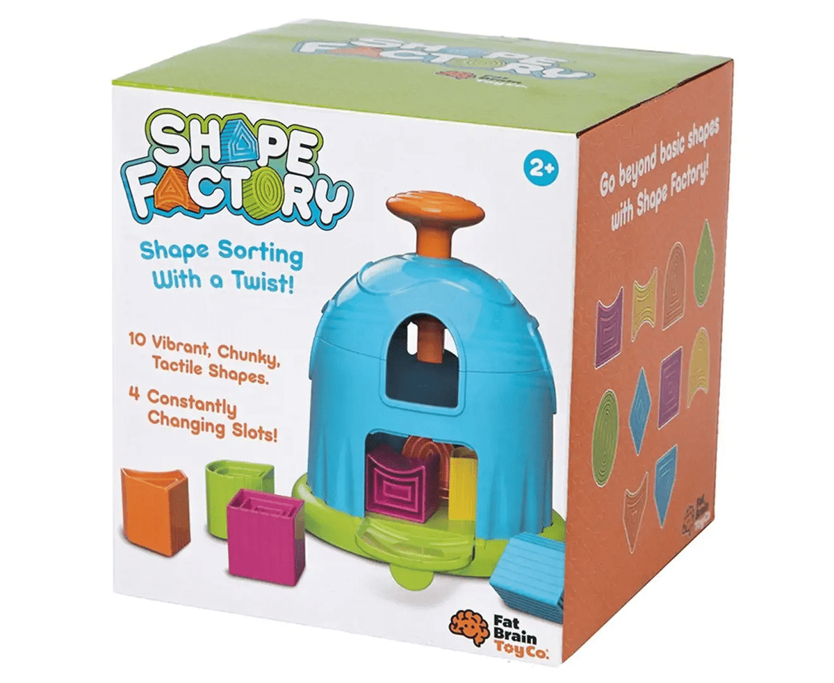 Shape-sorting puzzle playset box with blue dome toy and colorful blocks, age 2+