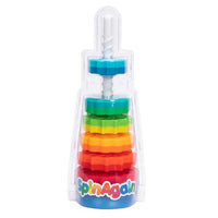 Stacking and spinning toy with clear white tower and rainbow ring segments