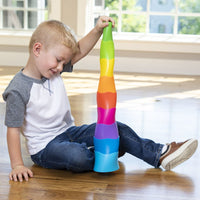 Colorful stacking toy with tall ridged columns in rainbow colors