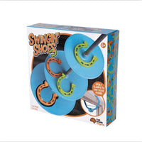 Fat Brain Toys Swingin’ Shoes game box front with blue horseshoe discs and door-clamp