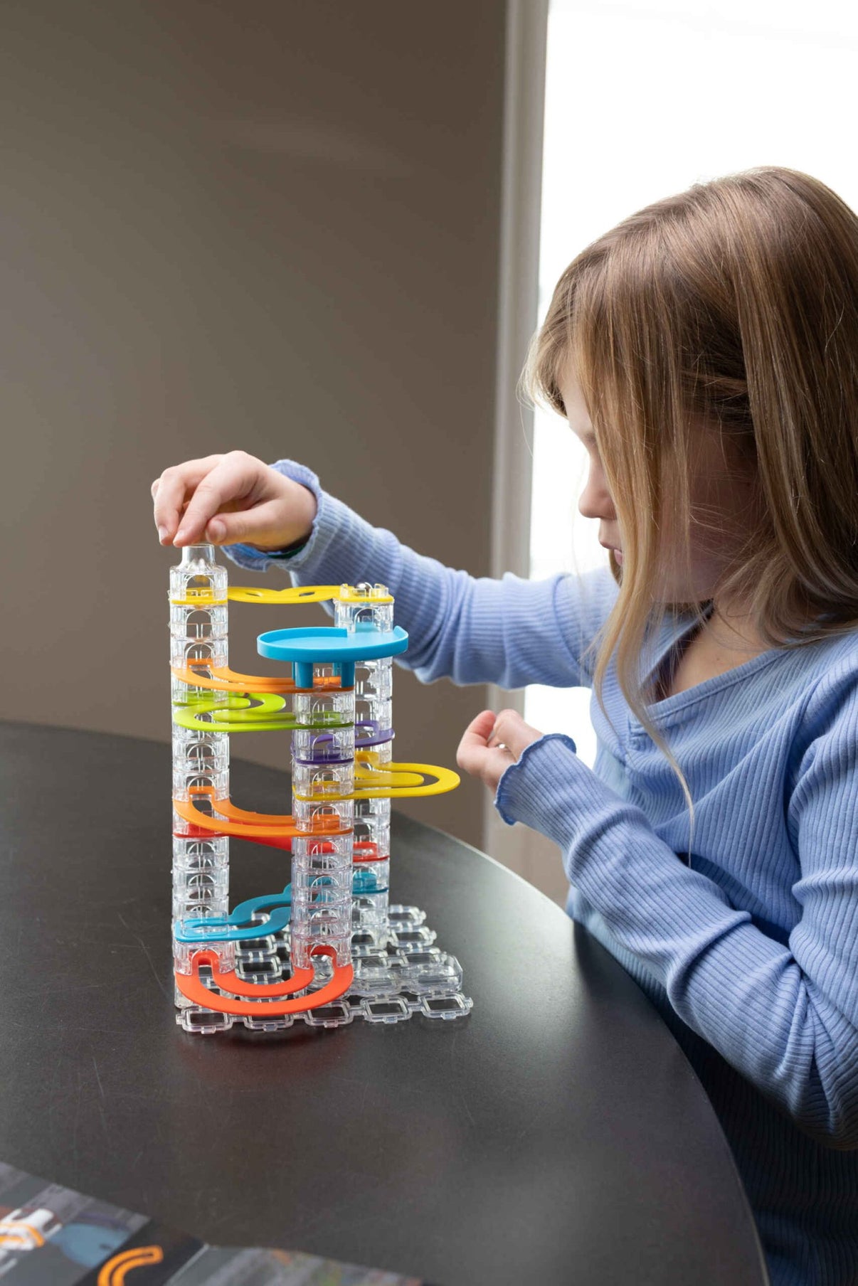 Trestle Tracks builder set with clear tubes, yellow and orange spiral tracks