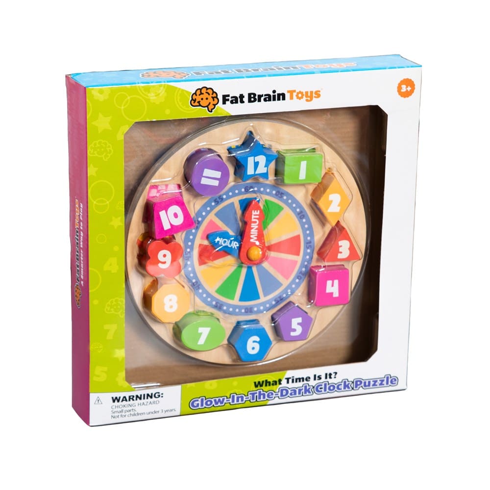 Glow-in-the-dark clock puzzle with colored number pieces and hands