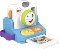 Fisher-Price instant camera toy with green smiling lens, ABC/123 buttons, blue base
