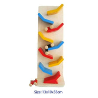 Assembled car race drop toy board with colorful curved tracks and wooden balls