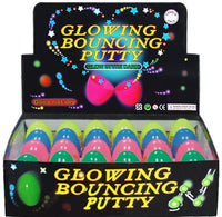 Glow-in-the-dark bouncing putty display box with colorful egg-style jars in tray