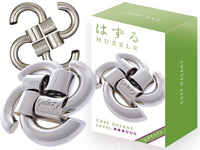 Metal cast puzzle toy shaped like a 3-piece claw with Galaxy label
