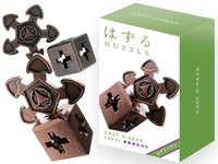 Hanayama Huzzle L3 O'Gear cast metal gear puzzle pieces, bronze and dark accents.