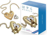 Brass heart-shaped puzzle necklace with interlocking metal hearts and chain