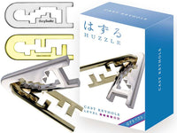 Metal keyhole puzzle with interlocking pieces and cast keyhole tray, in box