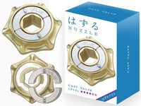 Brass cast metal valve puzzle with circular dial and rotating ring