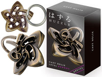 Brass metal helix puzzle with interlocking pieces and key ring