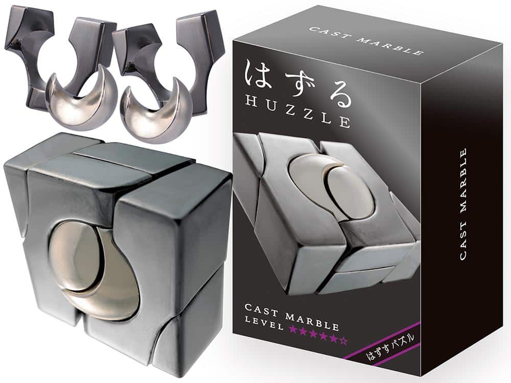 Cast marble level 5 puzzle with gray U-shaped pieces and retail box