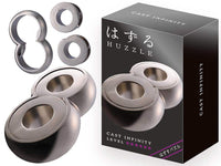 Metal cast Infinity puzzle with interlocking circular rings and oval gaps
