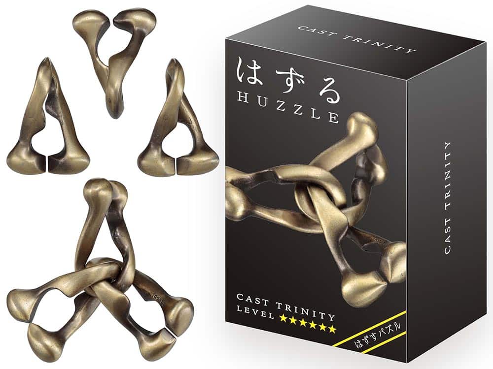 Cast Trinity metal puzzle set with brass-colored interlocking pieces in a box