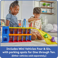 Numberblocks car garage playset with parking bays and mini vehicles on floor